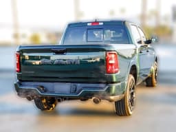 Ram 1500 Laramie 4x4 Crew Cab 5'7" Box 2026 — side view