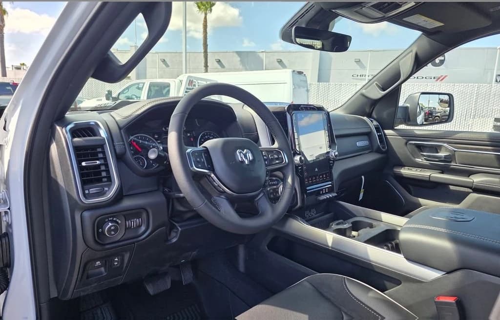 Ram 1500 Laramie 4x4 Crew Cab 5'7" Box 2026 — side view