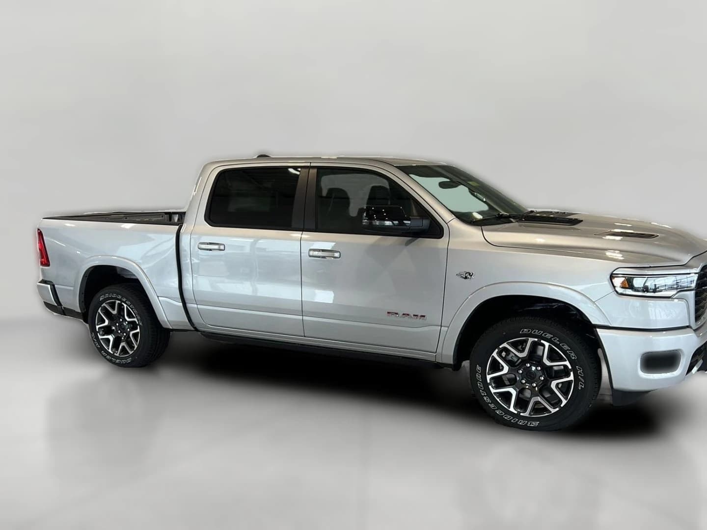 Ram 1500 Laramie 4x4 Crew Cab 5'7" Box 2026 — side view