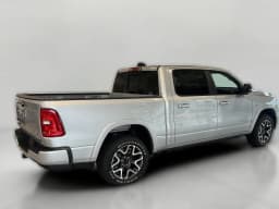 Ram 1500 Laramie 4x4 Crew Cab 5'7" Box 2026 — side view