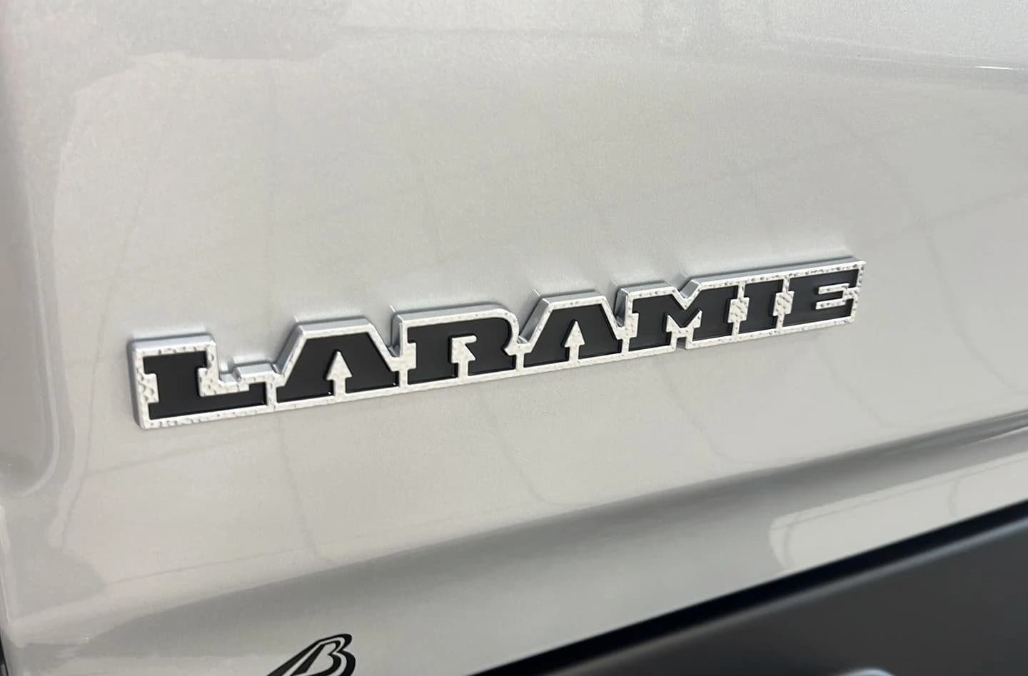 Ram 1500 Laramie 4x4 Crew Cab 5'7" Box 2026 — side view