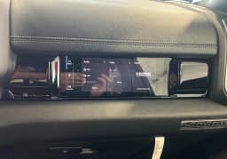 Ram 1500 Laramie 4x4 Crew Cab 5'7" Box 2026 — side view