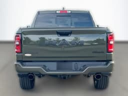 Ram 1500 Laramie 4x4 Crew Cab 5'7" Box 2026 — side view