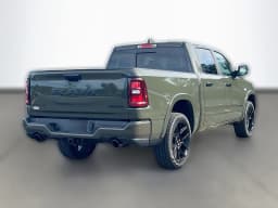 Ram 1500 Laramie 4x4 Crew Cab 5'7" Box 2026 — side view