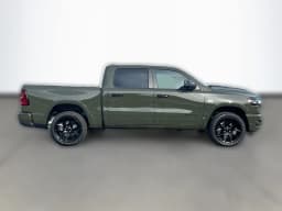 Ram 1500 Laramie 4x4 Crew Cab 5'7" Box 2026 — side view