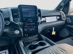 Ram 1500 Laramie 4x4 Crew Cab 5'7" Box 2026 — side view