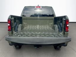 Ram 1500 Laramie 4x4 Crew Cab 5'7" Box 2026 — side view