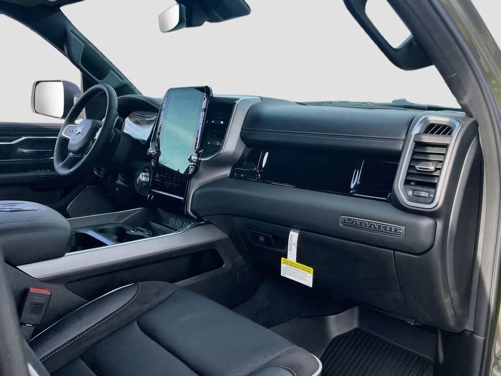 Ram 1500 Laramie 4x4 Crew Cab 5'7" Box 2026 — side view