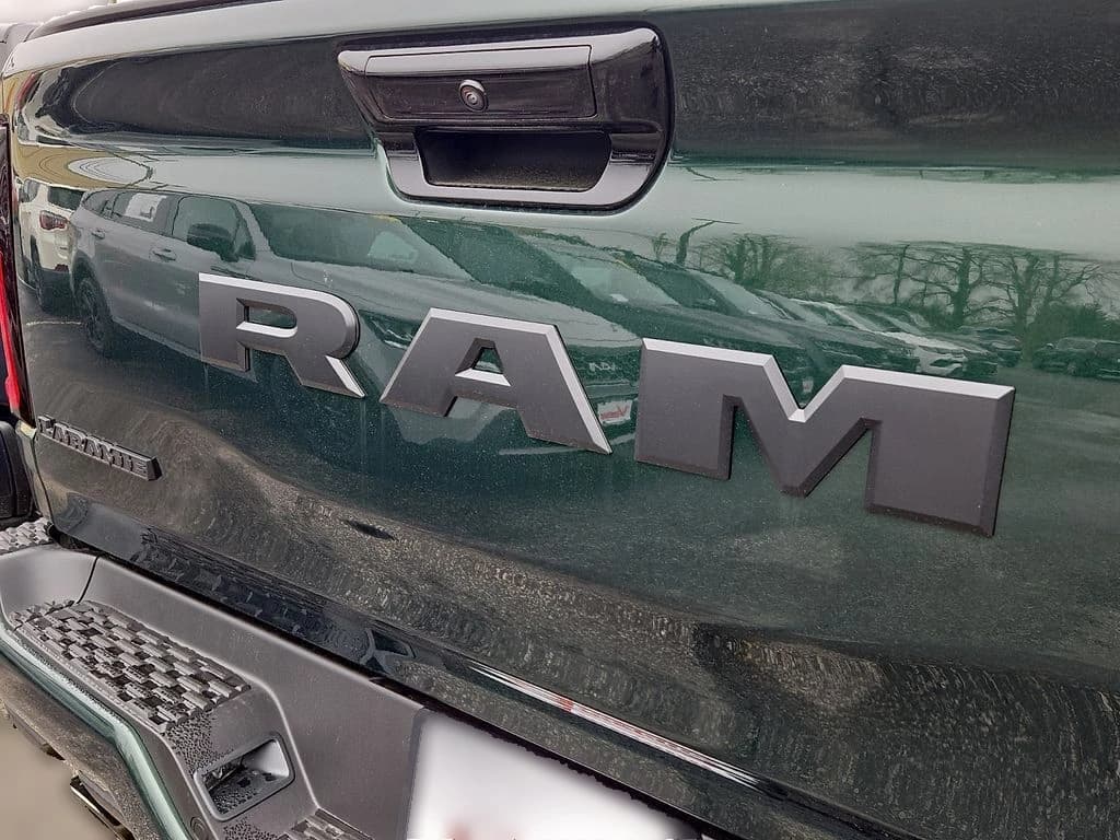 Ram 1500 Laramie 4x4 Crew Cab 5'7" Box 2026 — side view