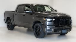 Ram 1500 Laramie 4x4 Crew Cab 5'7" Box 2026 — side view
