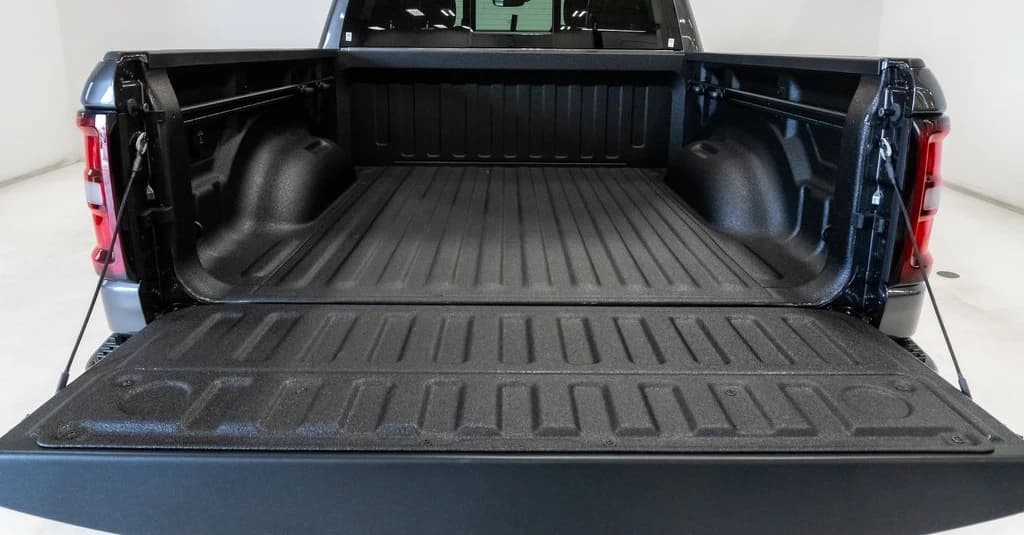Ram 1500 Laramie 4x4 Crew Cab 5'7" Box 2026 — side view