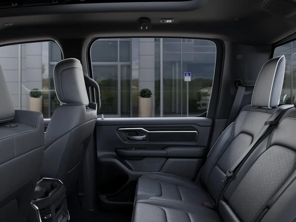Ram 1500 Laramie 4x4 Crew Cab 5'7" Box 2026 — side view