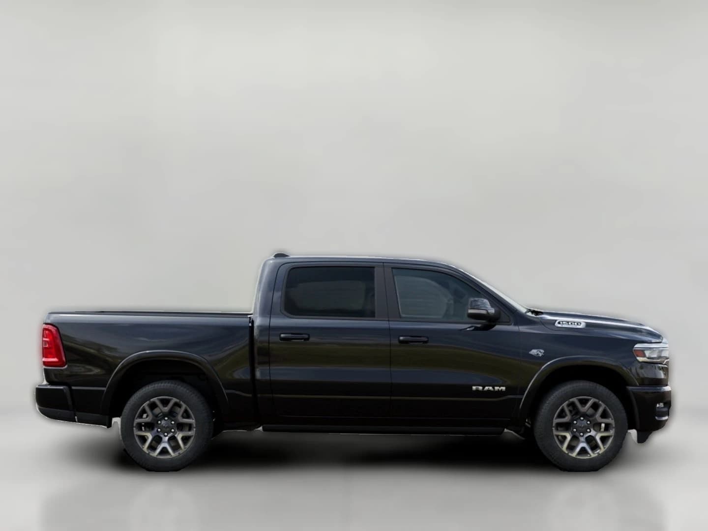 Ram 1500 Laramie 4x4 Crew Cab 5'7" Box 2026 — side view