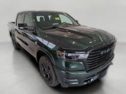 Ram 1500 Laramie 4x4 Crew Cab 5'7" Box 2026 — side view
