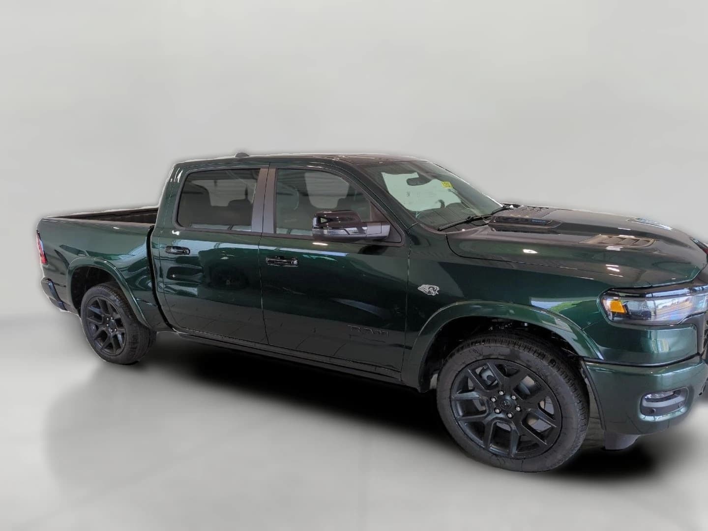 Ram 1500 Laramie 4x4 Crew Cab 5'7" Box 2026 — side view