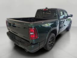 Ram 1500 Laramie 4x4 Crew Cab 5'7" Box 2026 — side view