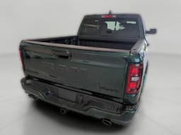 Ram 1500 Laramie 4x4 Crew Cab 5'7" Box 2026 — side view