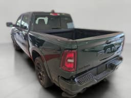 Ram 1500 Laramie 4x4 Crew Cab 5'7" Box 2026 — side view