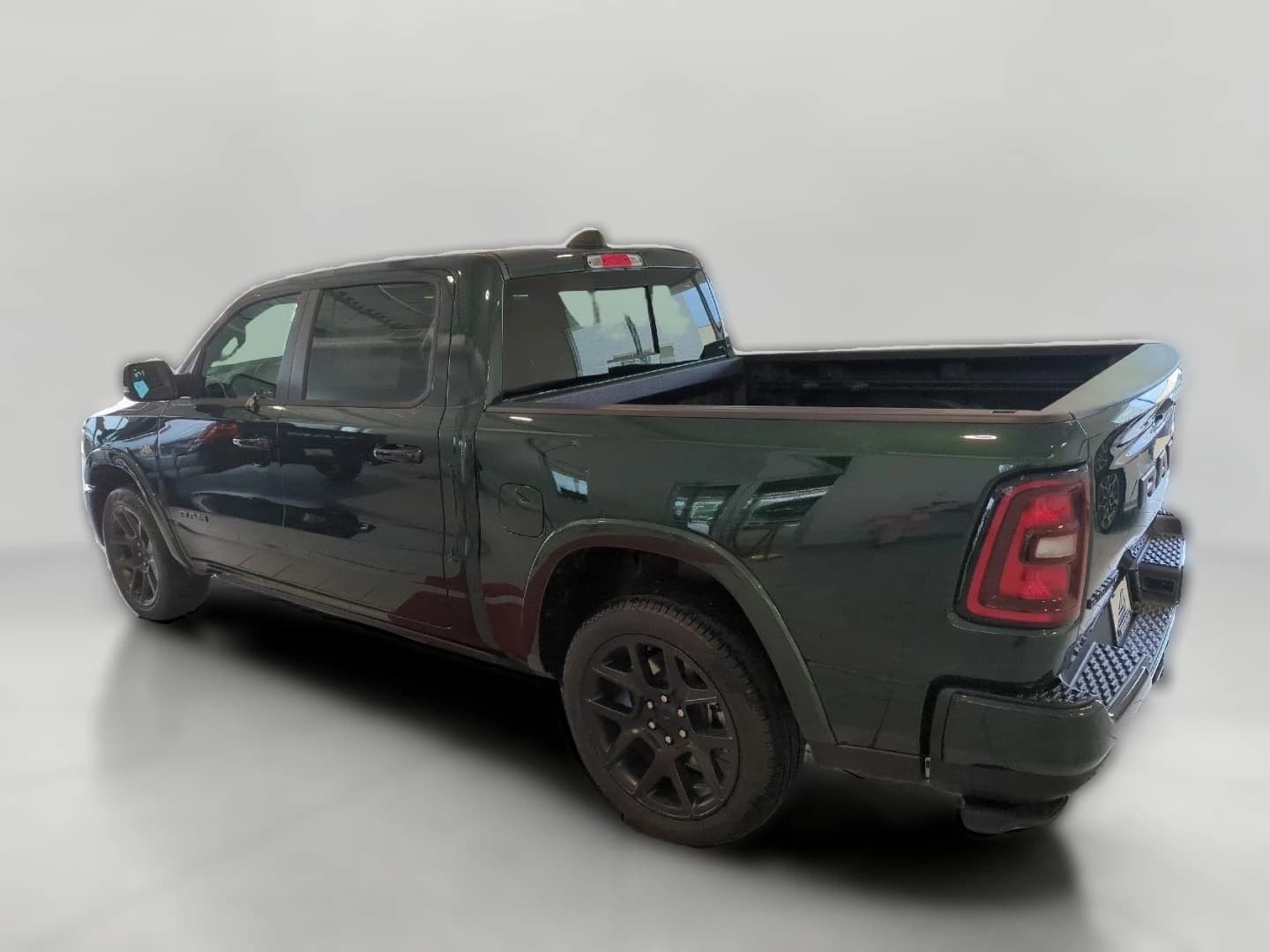 Ram 1500 Laramie 4x4 Crew Cab 5'7" Box 2026 — side view