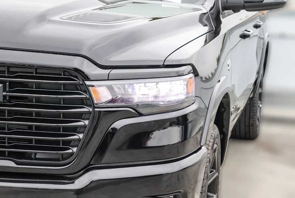 Ram 1500 Laramie 4x4 Crew Cab 5'7" Box 2026 — side view