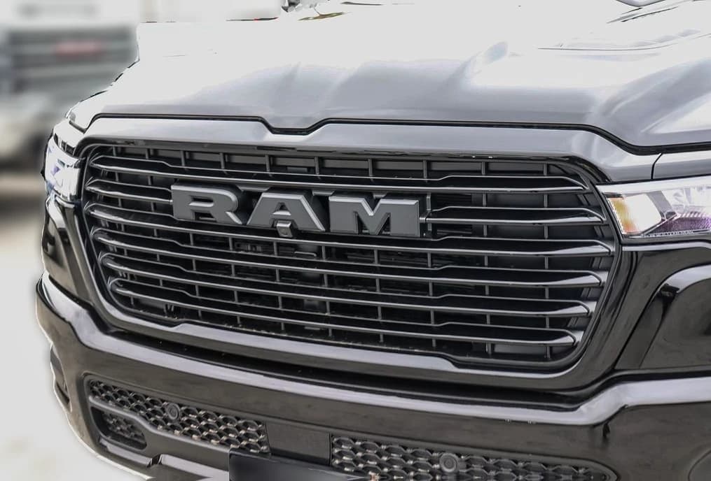 Ram 1500 Laramie 4x4 Crew Cab 5'7" Box 2026 — side view