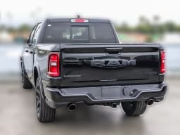 Ram 1500 Laramie 4x4 Crew Cab 5'7" Box 2026 — side view