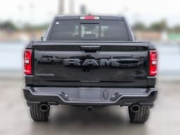 Ram 1500 Laramie 4x4 Crew Cab 5'7" Box 2026 — side view