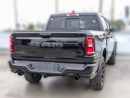 Ram 1500 Laramie 4x4 Crew Cab 5'7" Box 2026 — side view