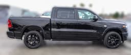 Ram 1500 Laramie 4x4 Crew Cab 5'7" Box 2026 — side view
