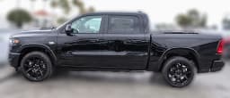 Ram 1500 Laramie 4x4 Crew Cab 5'7" Box 2026 — side view