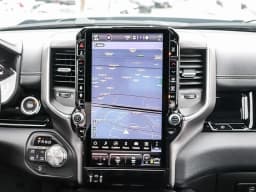 Ram 1500 Laramie 4x4 Crew Cab 5'7" Box 2026 — side view