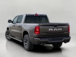 Ram 1500 Laramie 4x4 Crew Cab 5'7" Box 2026 — side view