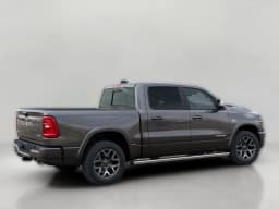 Ram 1500 Laramie 4x4 Crew Cab 5'7" Box 2026 — side view