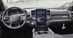 Ram 1500 Laramie 4x4 Crew Cab 5'7" Box 2026 — side view
