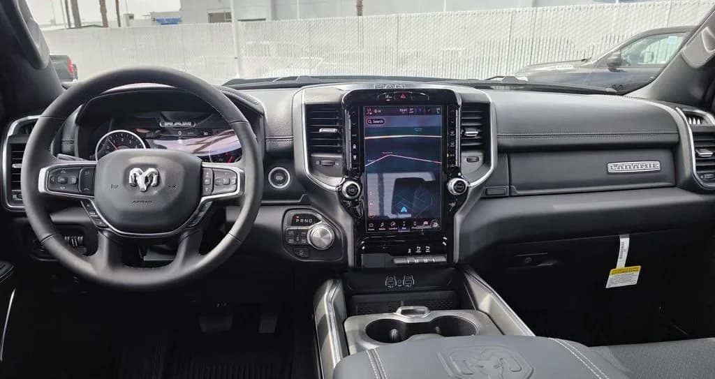 Ram 1500 Laramie 4x4 Crew Cab 5'7" Box 2026 — side view