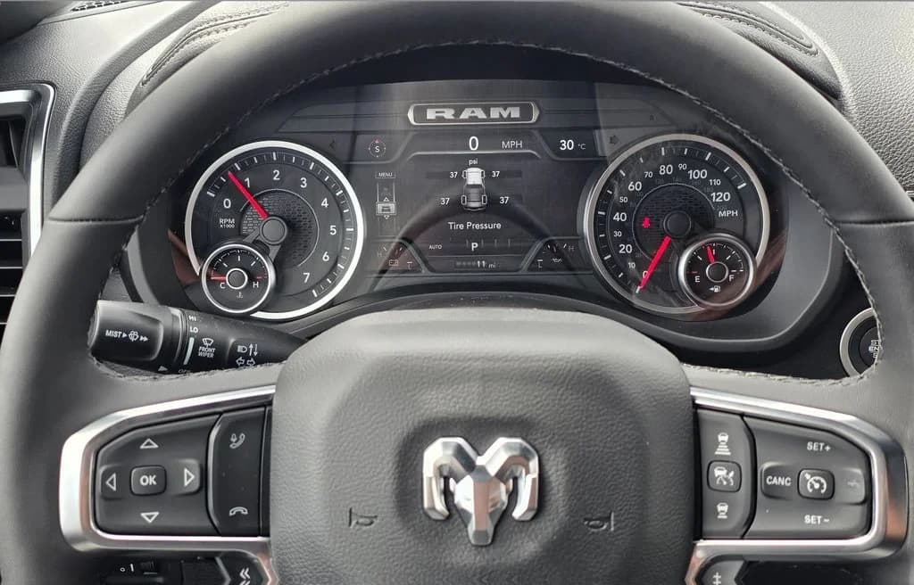 Ram 1500 Laramie 4x4 Crew Cab 5'7" Box 2026 — side view