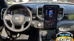 Ram 1500 Laramie 4x4 Crew Cab 5'7" Box 2026 — side view