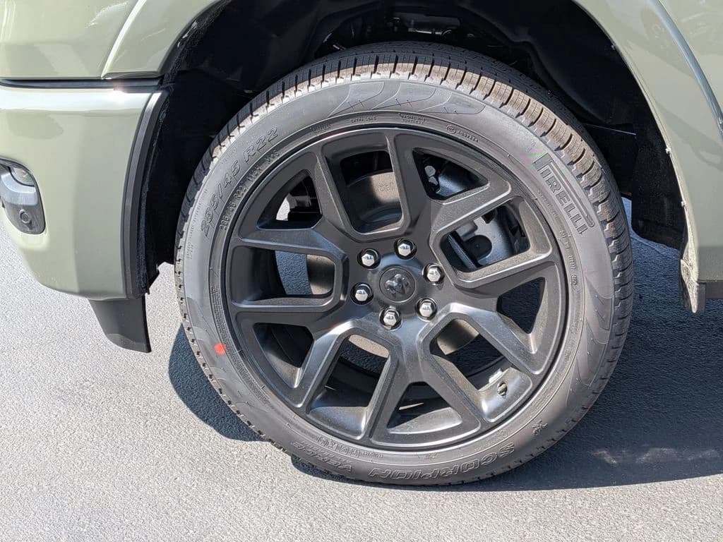 Ram 1500 Laramie 4x4 Crew Cab 5'7" Box 2026 — side view
