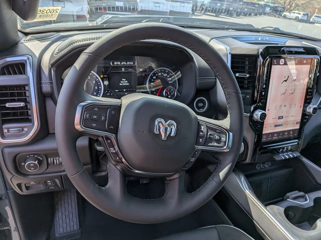 Ram 1500 Laramie 4x4 Crew Cab 5'7" Box 2026 — side view