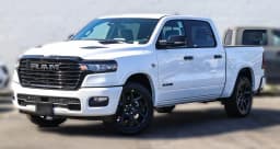 Ram 1500 Laramie 4x4 Crew Cab 5'7" Box 2026 — side view