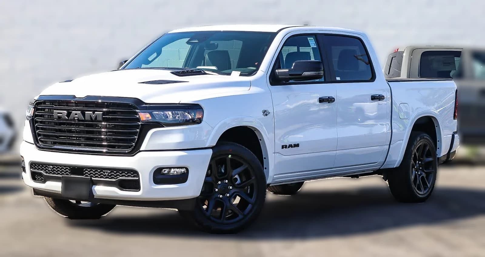 Ram 1500 Laramie 4x4 Crew Cab 5'7" Box 2026 — side view