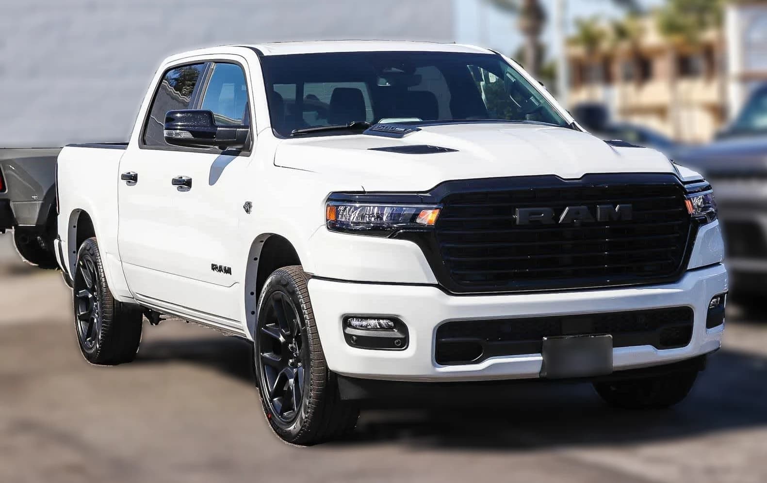 Ram 1500 Laramie 4x4 Crew Cab 5'7" Box 2026 — side view