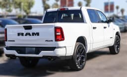 Ram 1500 Laramie 4x4 Crew Cab 5'7" Box 2026 — side view