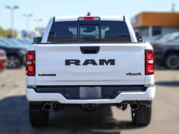 Ram 1500 Laramie 4x4 Crew Cab 5'7" Box 2026 — side view