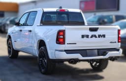 Ram 1500 Laramie 4x4 Crew Cab 5'7" Box 2026 — side view