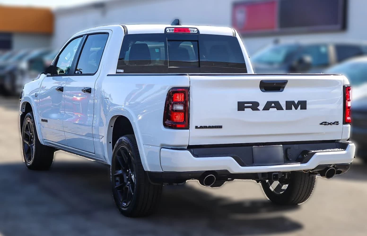 Ram 1500 Laramie 4x4 Crew Cab 5'7" Box 2026 — side view