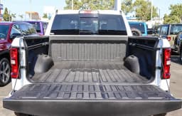 Ram 1500 Laramie 4x4 Crew Cab 5'7" Box 2026 — side view