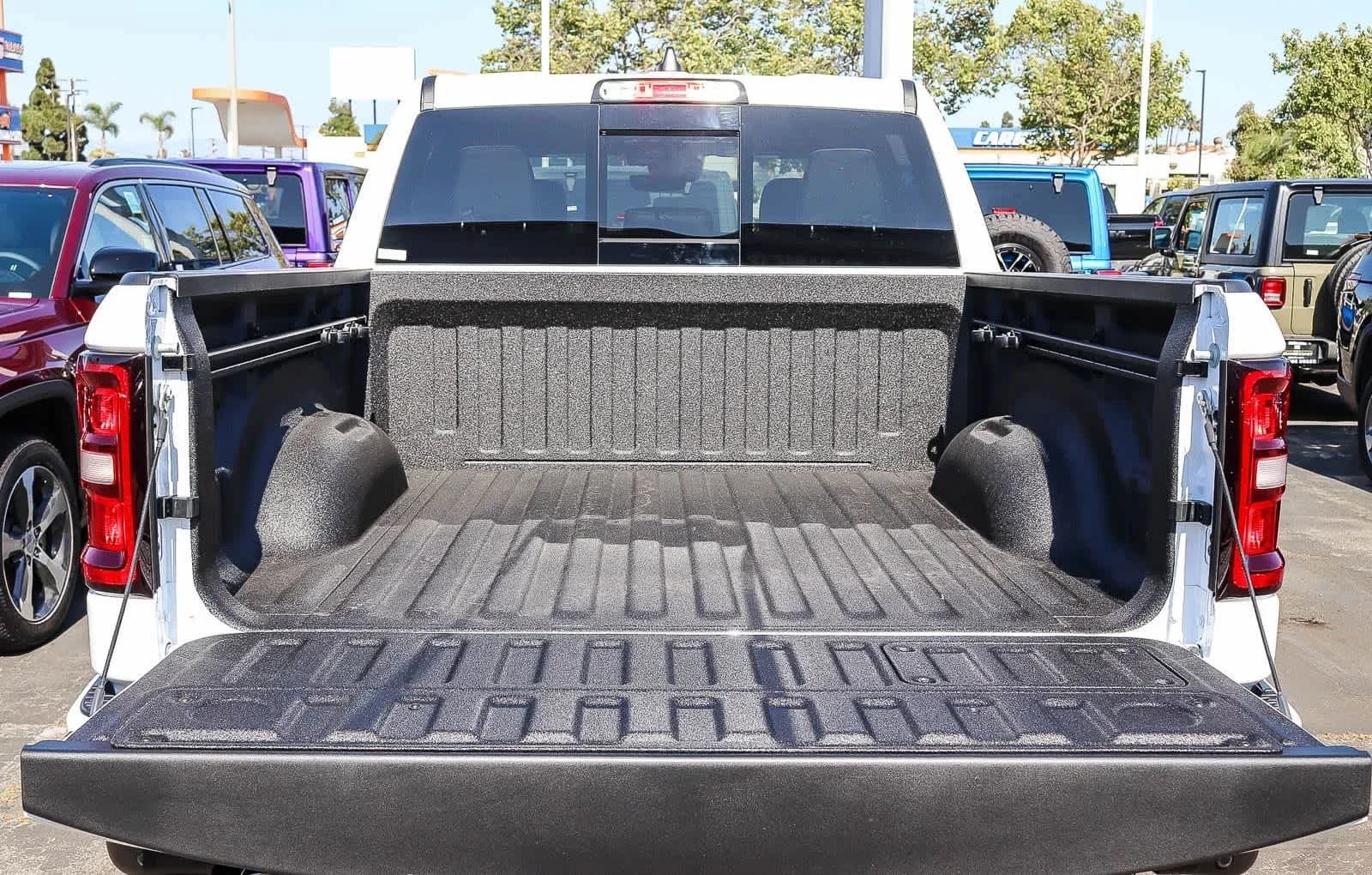 Ram 1500 Laramie 4x4 Crew Cab 5'7" Box 2026 — side view