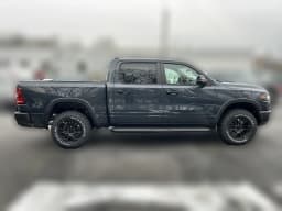 Ram 1500 Rebel 4x4 Crew Cab 5'7" Box 2026 — side view