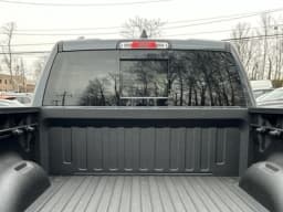 Ram 1500 Rebel 4x4 Crew Cab 5'7" Box 2026 — side view